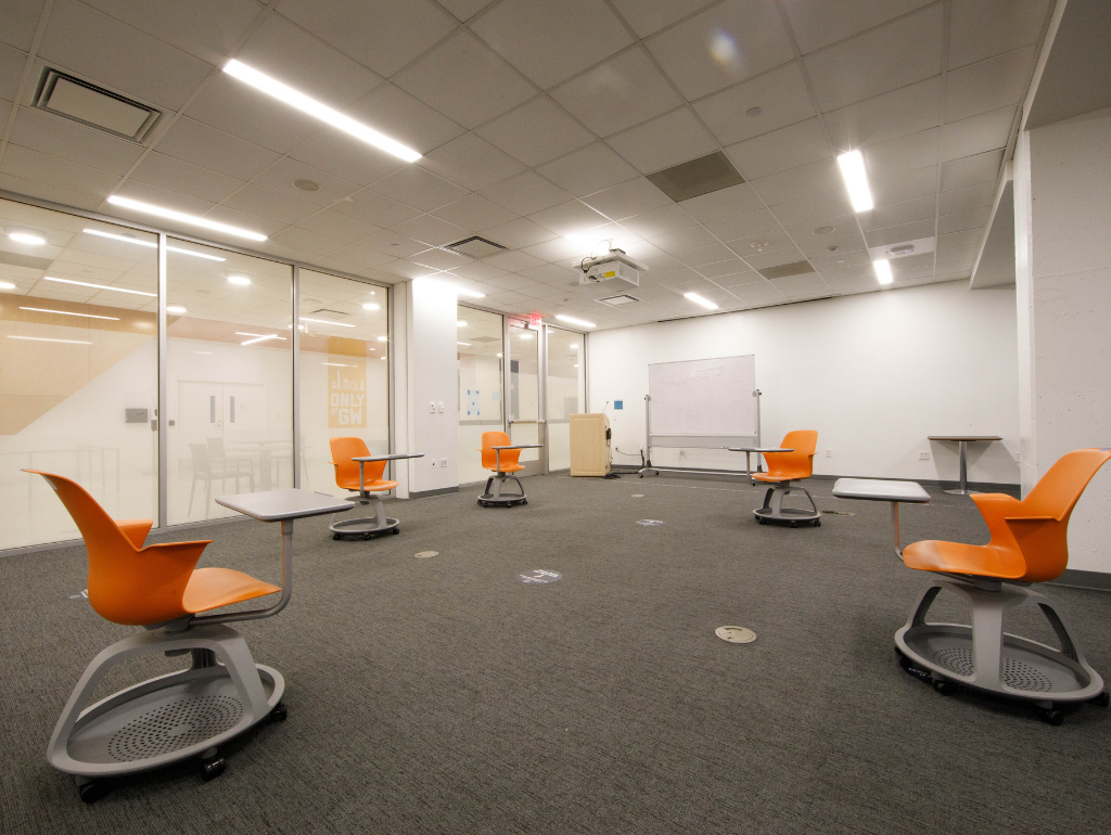 District House B205 with 5 orange classroom chairs in a circle