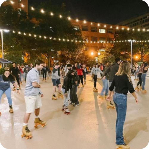 Student life event at night with students roller skating