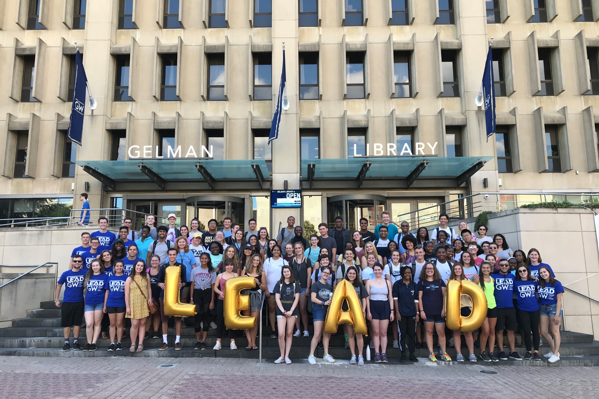 Around 80 LEAD participant and guides in front of Gelman Library in Kogan Plaza.