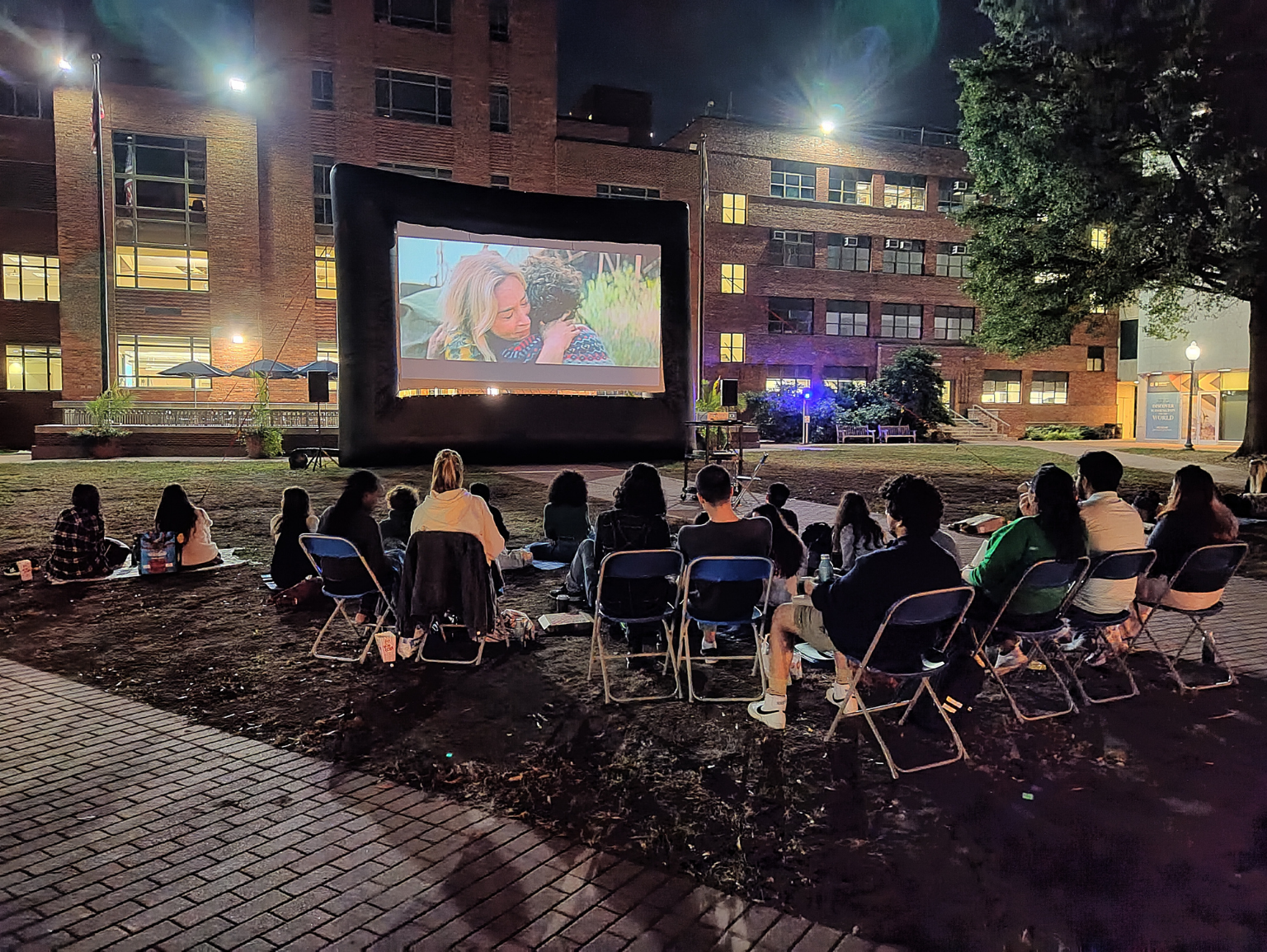 Students watch A Quiet Place, Part II in U Yard at the GW Late Night movie night event