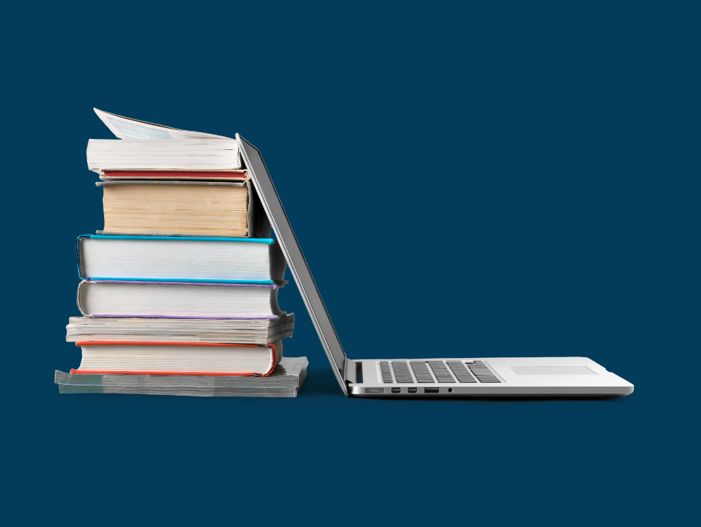 Navy blue background with an image of a laptop leaning against a stack of textbooks